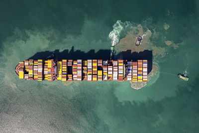 Aerial top view container cargo ship in import export logistic and transportation.