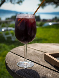 Close-up of wineglass on table