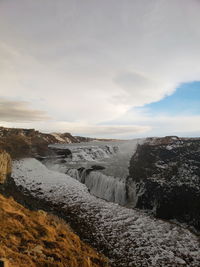 Scenic view of land against sky during winter