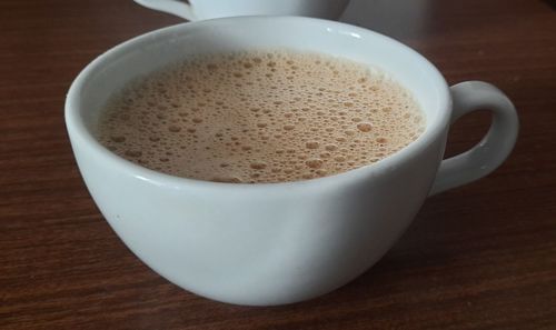 High angle view of coffee on table