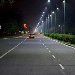 Illuminated street lights at night