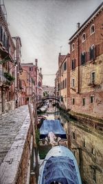 View of canal along buildings