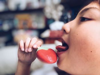 Close-up of woman eating ice cream