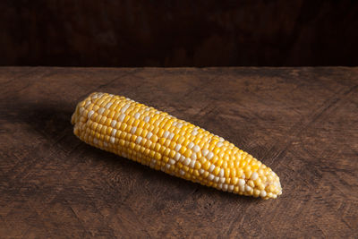 Close-up of corn on table