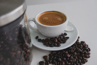 High angle view of coffee cup on table