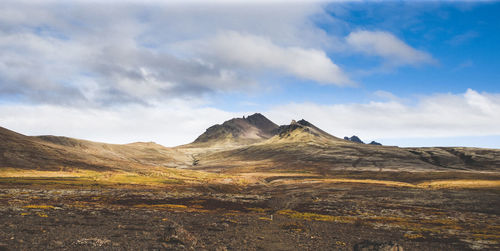 Scenic view of mountains against sky