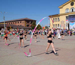 Group of people in front of buildings