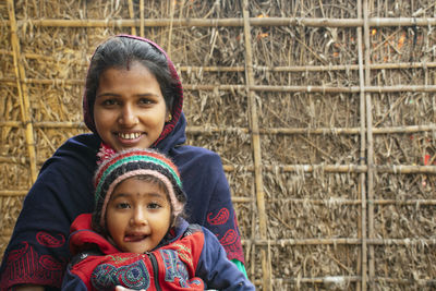 Portrait of happy mother and daughter