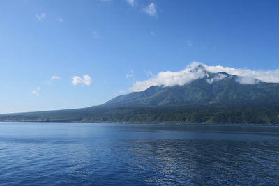 Scenic view of sea against blue sky