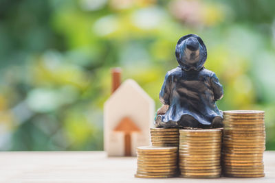 Close-up of statue on table