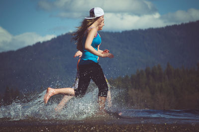 Full length of woman in water