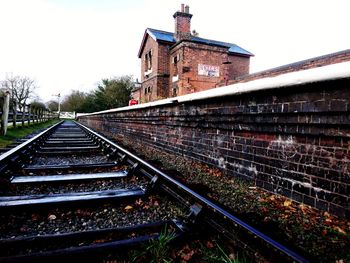 Railroad tracks against clear sky