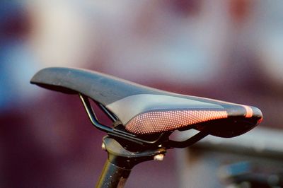 Close-up of bicycle seat against blurred background