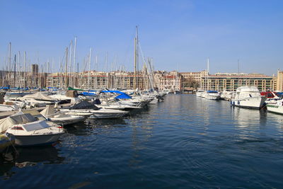 Boats moored in harbor