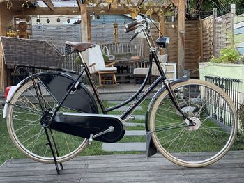 Bicycle parked on footpath in city