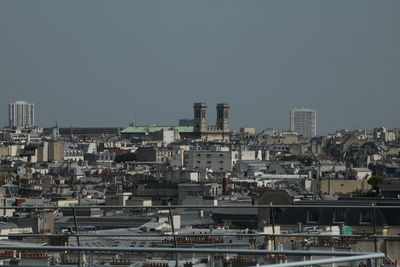 Cityscape against clear sky