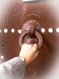 Close-up of hand holding ice cream