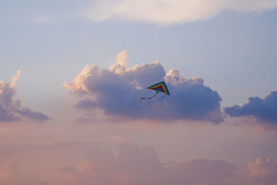Low angle view of airplane flying in sky