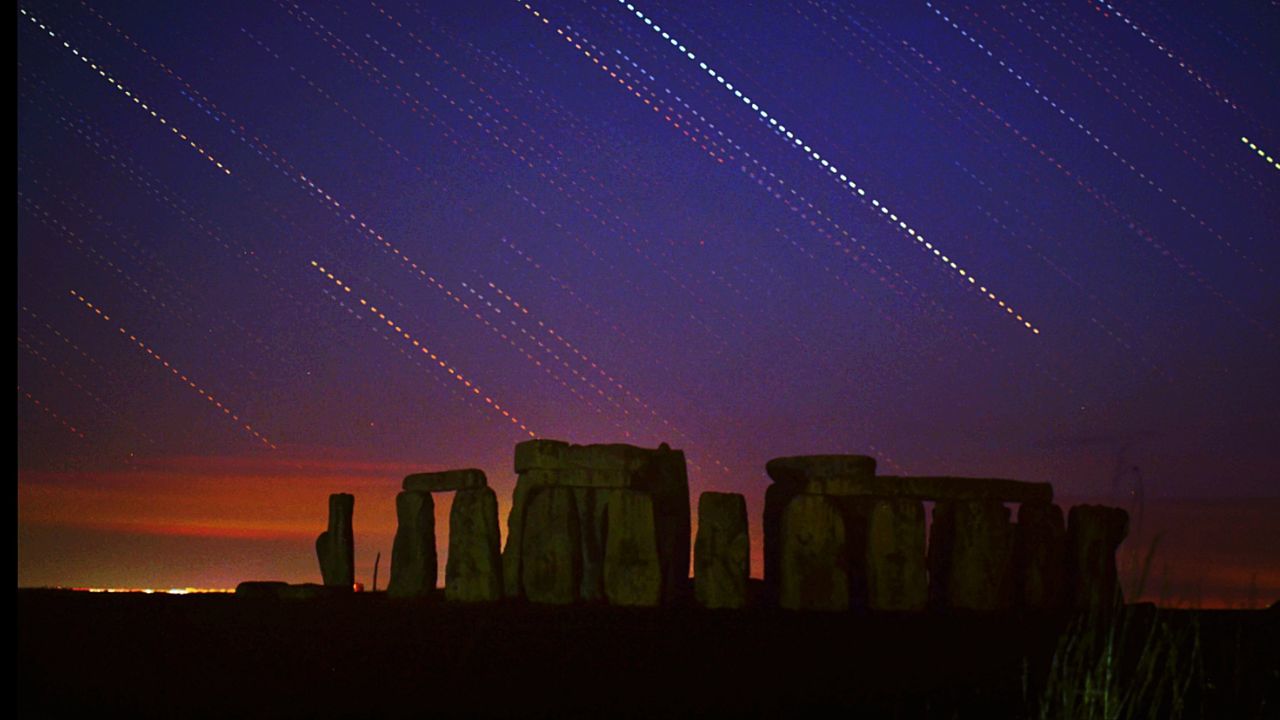 night, sky, architecture, no people, nature, built structure, landscape, building exterior, silhouette, scenics - nature, beauty in nature, environment, travel destinations, outdoors, low angle view, tranquil scene, travel, illuminated, land, dark, architectural column, ancient civilization, archaeology