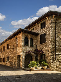Low angle view of old building against sky