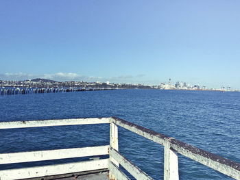 Scenic view of sea against clear blue sky