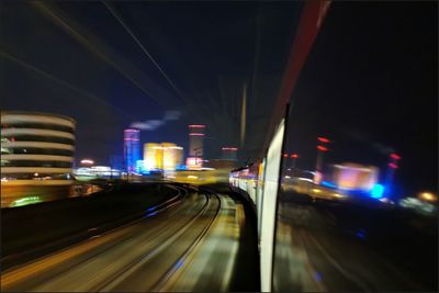 Light trails on city street at night