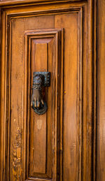 Close-up of closed door with handle