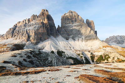 Rock formations on landscape against sky