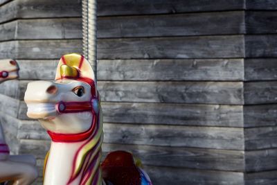 Close-up of stuffed toy against wall