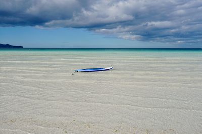 Nautical vessel on sea against sky