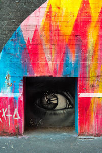Close-up of graffiti on wall