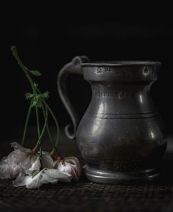 Close-up of vegetables on table against black background