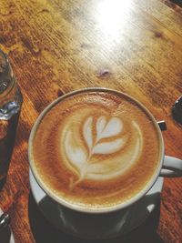 High angle view of cappuccino on table