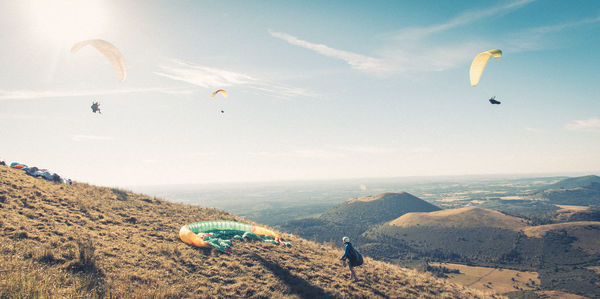 Paragliders on the summit of puy-de-dôme in summer