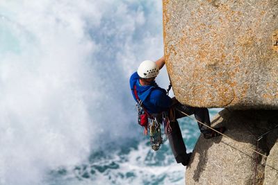 Man climbing on rock