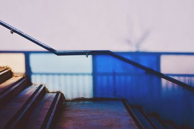 Railing against sky