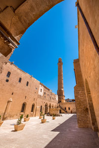 View of historic building against blue sky