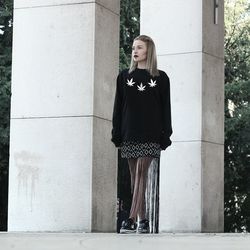 Full length of woman standing in park