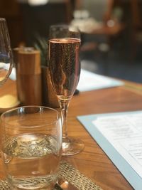 Close-up of champagne flute on table at restaurant