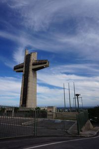 Low angle view of built structure against blue sky