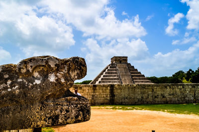 View of historical building against cloudy sky