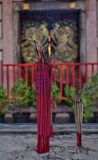 Close-up of incense burning in temple