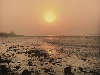 Scenic view of sea at sunset