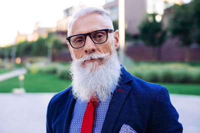 Portrait of man standing outdoors