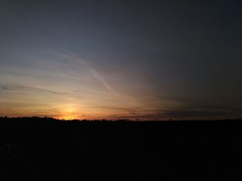 Scenic view of silhouette landscape against sky during sunset