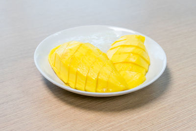 Close-up of fruits in plate on table