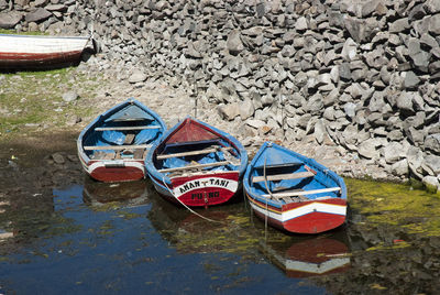 High angle view of boats moored on shore