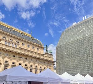 Low angle view of the opera house in prague against sky