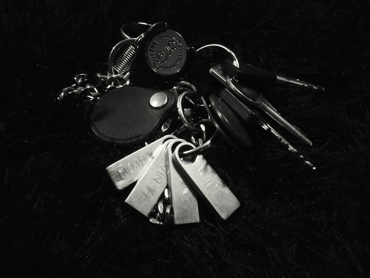 HIGH ANGLE VIEW OF PADLOCKS ON METAL TABLE