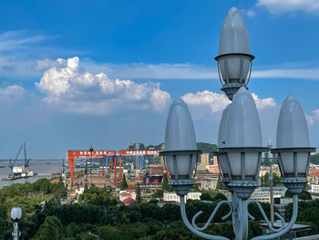 Metallic structure against sky in city